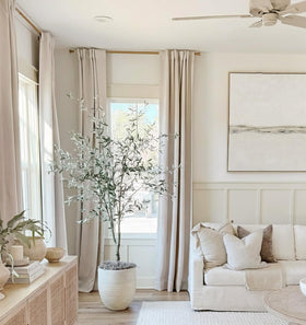 INOVADAY cream bedroom curtains create a cozy, dark room ambiance.