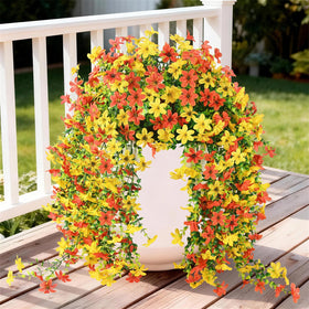 INQCMY artificial daisy outdoor porch arrangement adds year-round color.