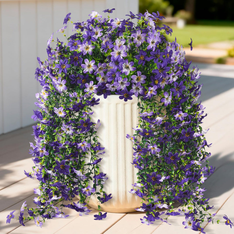 INQCMY artificial daisy with eucalyptus for outdoor use; vibrant, low-maintenance decor.