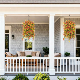 INQCMY decorative faux flowers for indoors or outdoors in window boxes.