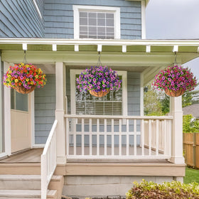 INQCMY garden balcony setup with faux blooms enhancing space