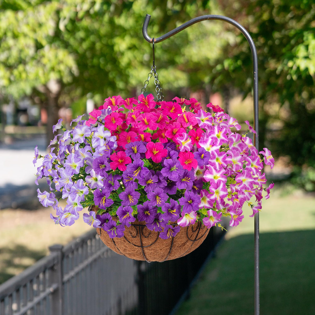 Balanced outdoor arrangement of INSPRING faux flowers with greenery