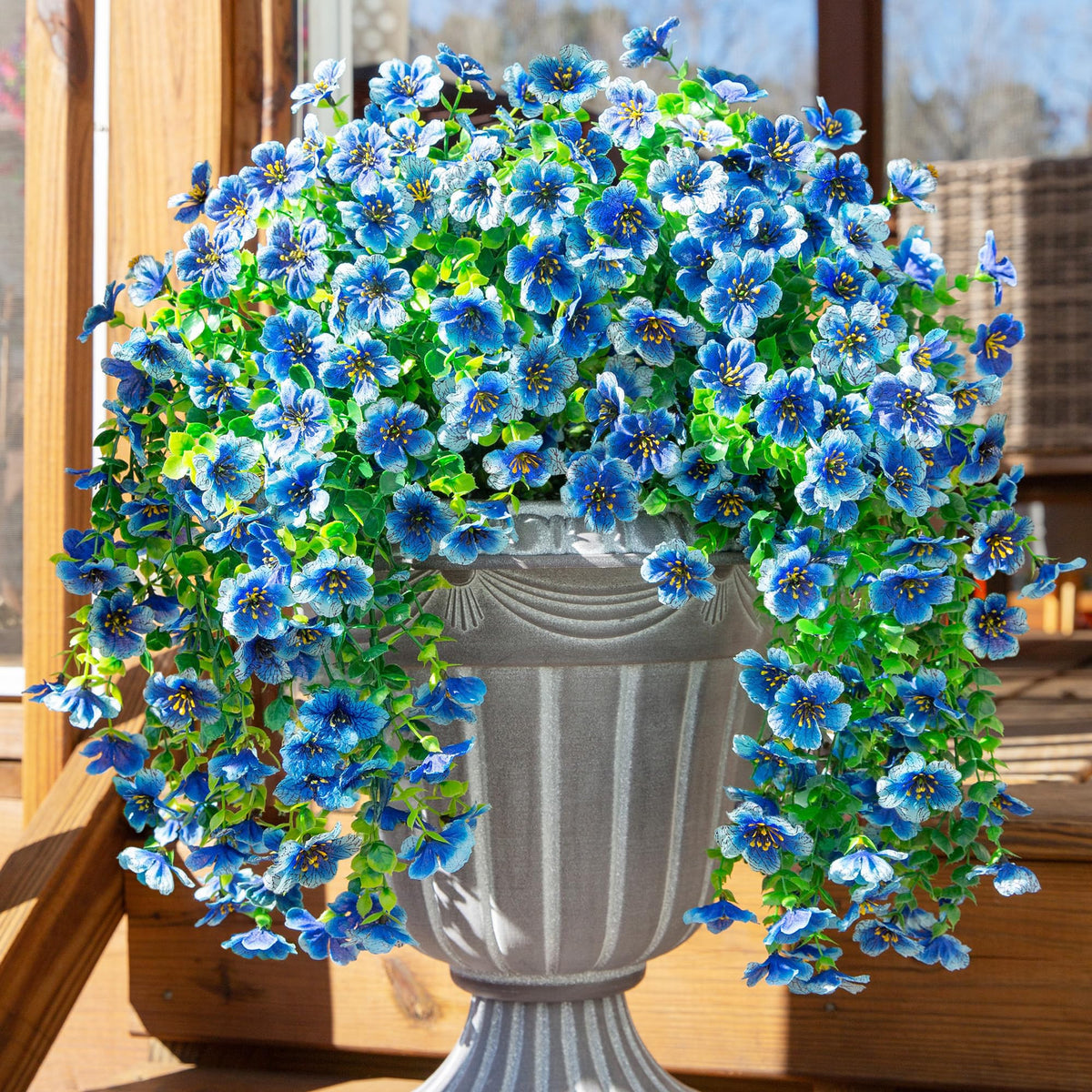 INSPRING artificial violets with eucalyptus trailing hanging adds vibrant blue color to outdoor spaces.