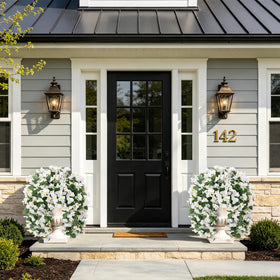 INSPRING White bougainvillea clusters with lush greenery accents.