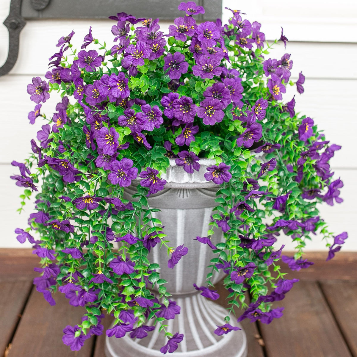 INSPRING fake silk daisy with eucalyptus trailing vines for year-round charm.