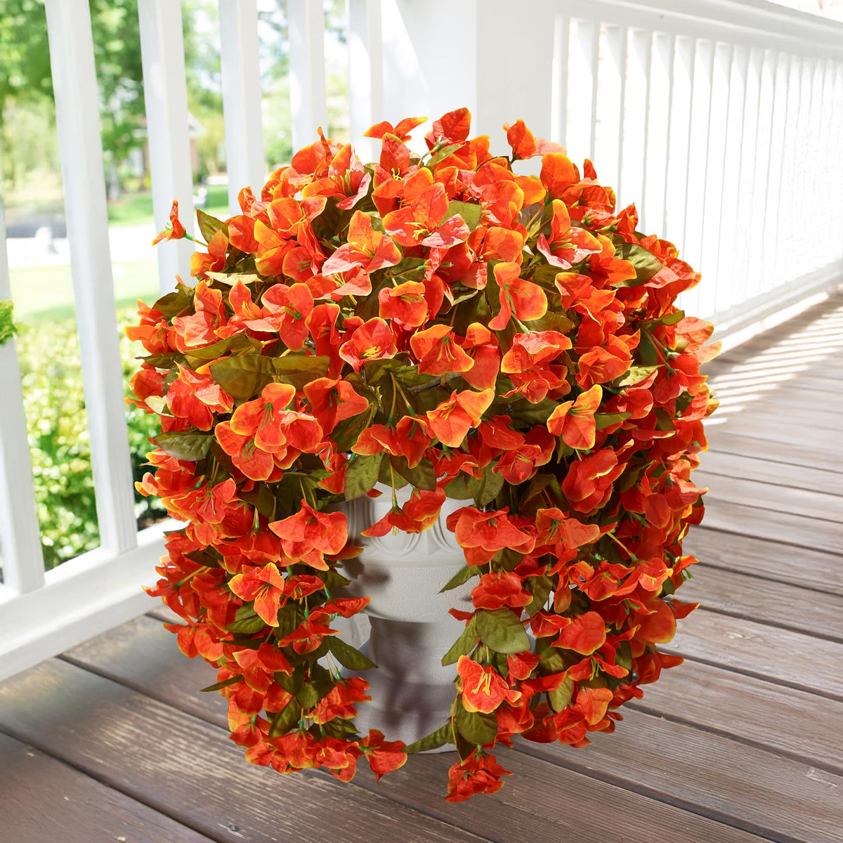 INSPRING orange faux bougainvillea flowers brighten entrances year-round.