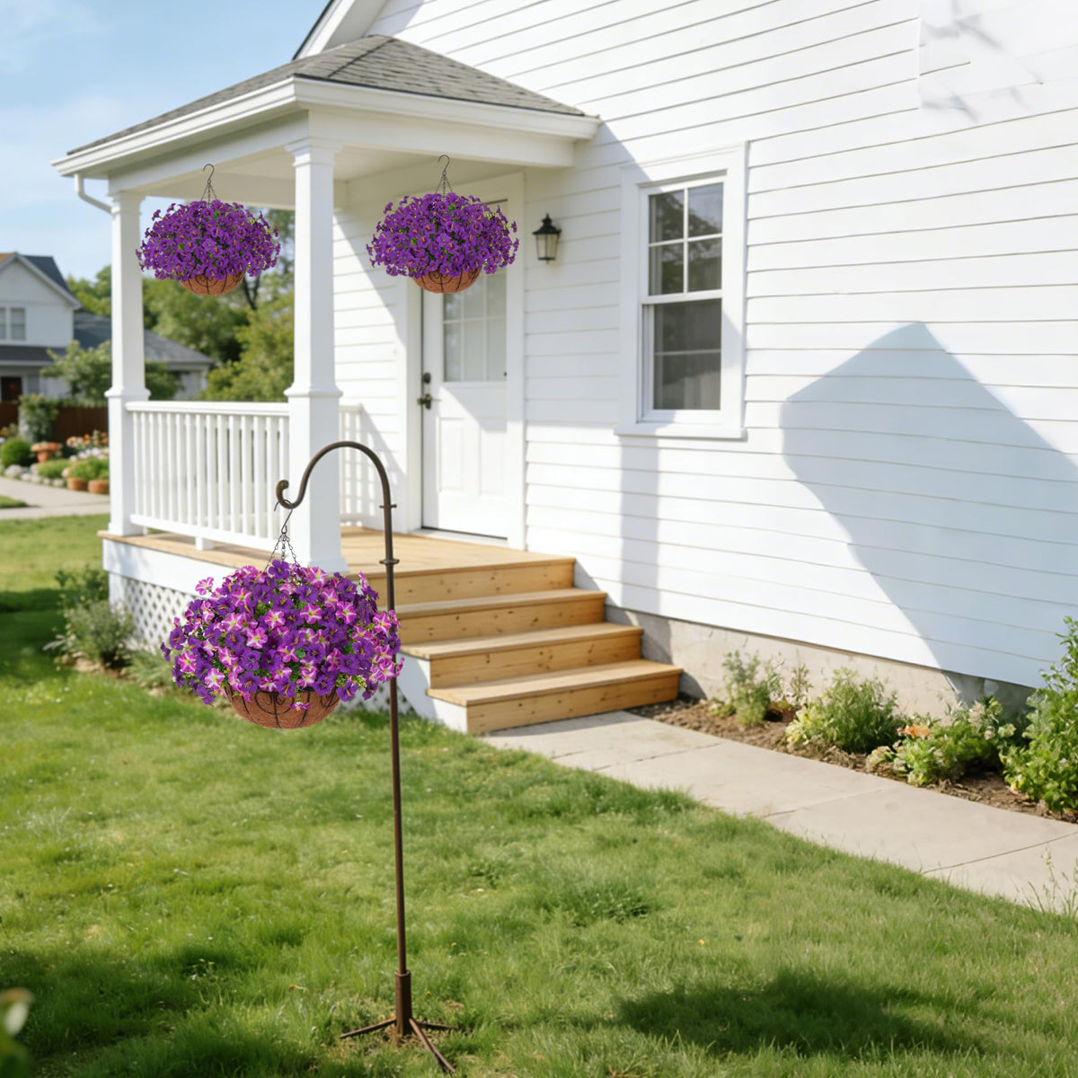 INSPRING hanging basket with assembled petunias and eucalyptus leaves for an easy DIY focal point.