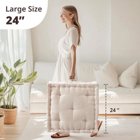 Intelligent Design Azza floor pillow ivory care close-up, spot-clean only to preserve color.