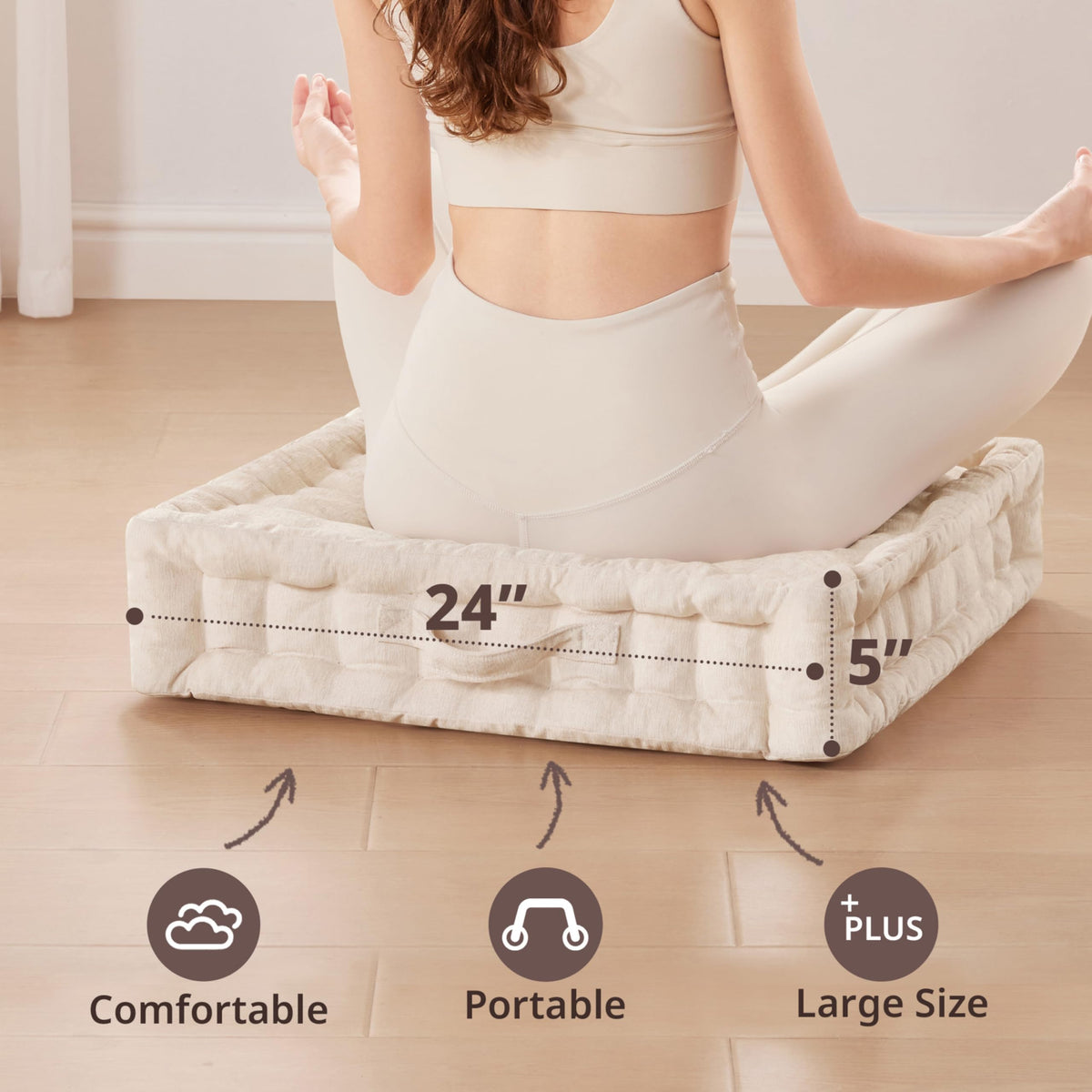 Intelligent Design Azza floor pillow ivory handle close-up, easy to carry between rooms.