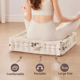 Intelligent Design Azza floor pillow ivory handle close-up, easy to carry between rooms.