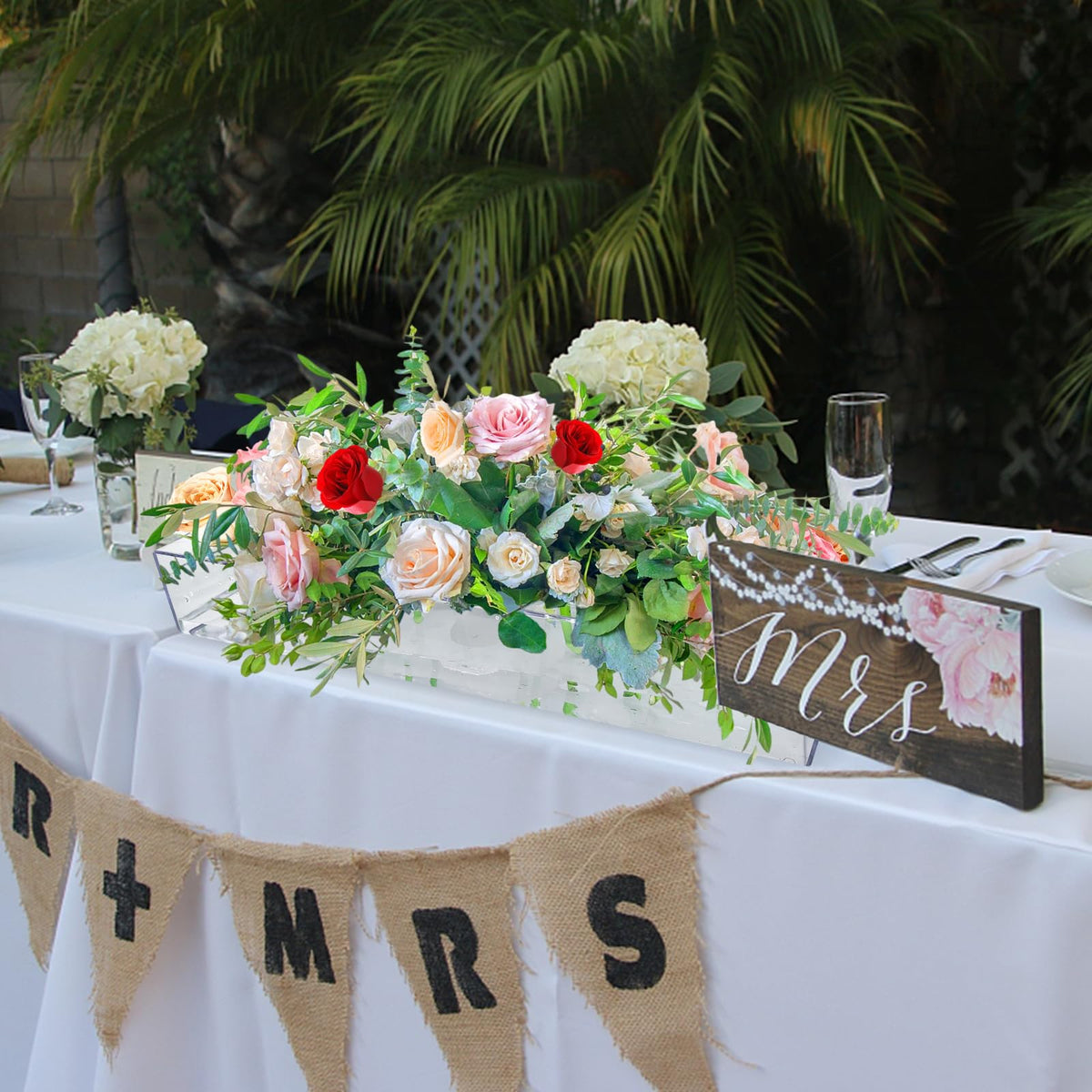 Low-profile dining vase preserves sightlines while enhancing table decor
