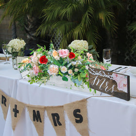 Low-profile dining vase preserves sightlines while enhancing table decor