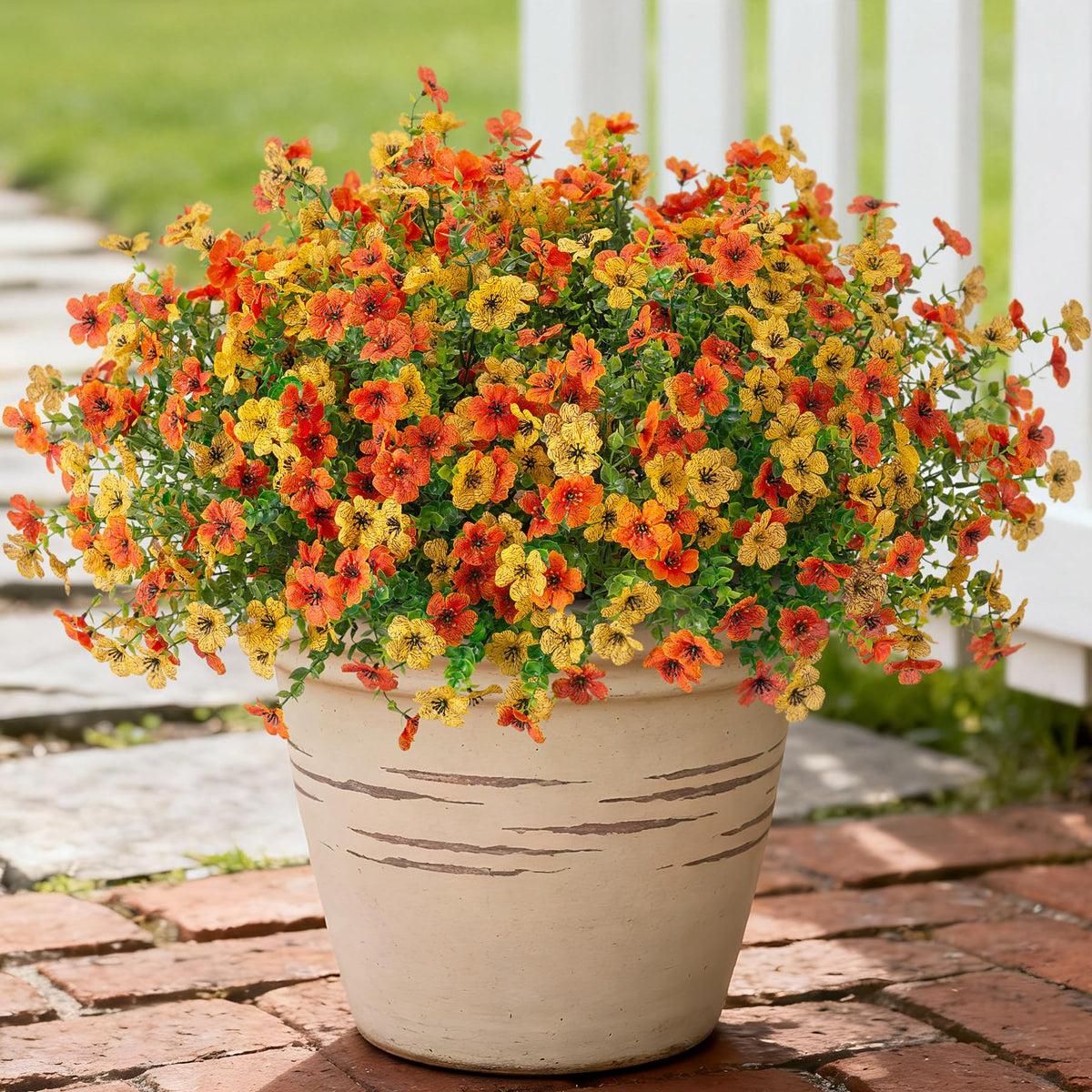 INXUGAO daisy bundle in yellow and orange brightens outdoor space.