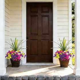 INXUGAO outdoor planter display with mock flowers brightens porches.