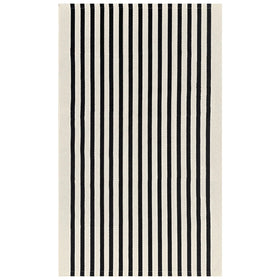 IOHOUZE outdoor-friendly rug protects floors and greets guests at entrances.