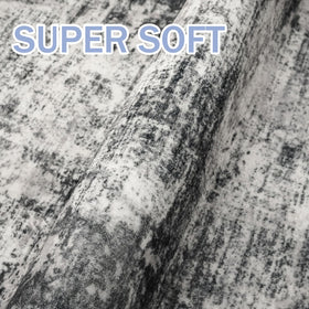 IOHOUZE Abstract printed design highlights black gray white splashes.
