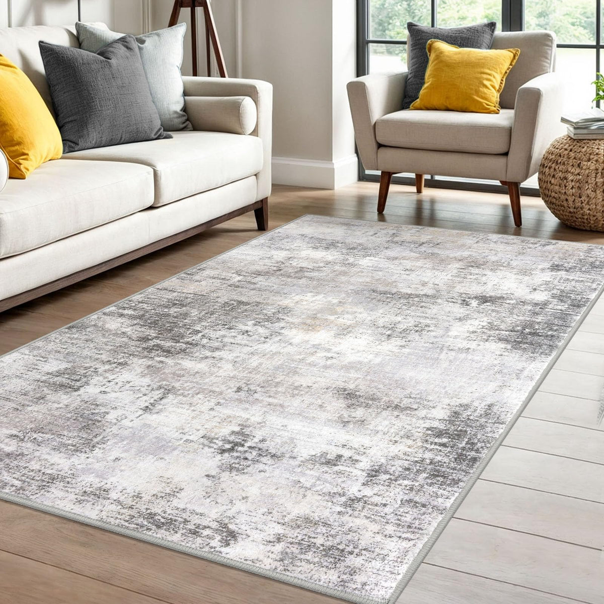 IOHOUZE abstract area rug in grey-beige enhances entryways with non-slip backing.