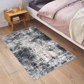 IOHOUZE entryway rug with non-slip backing keeps busy doorways in place.