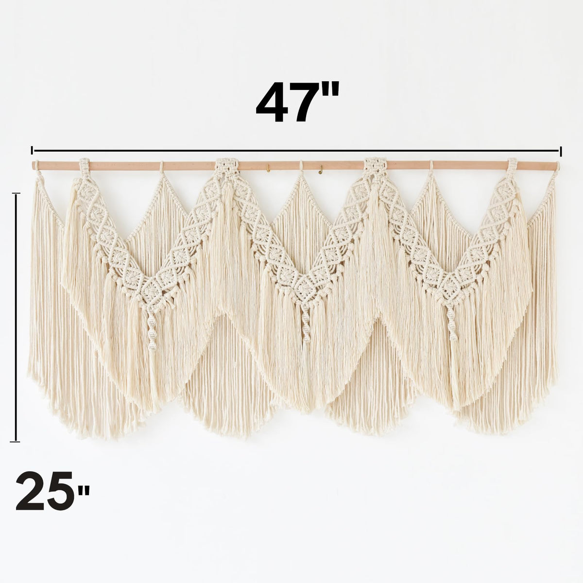IOWER macrame wall hanging fringe closeup emphasizes soft cotton fibers