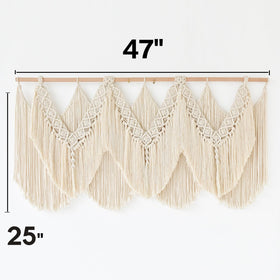 IOWER macrame wall hanging fringe closeup emphasizes soft cotton fibers
