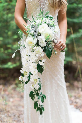 IPOPU wedding centerpiece ideas using white delphinium and clematis greens.