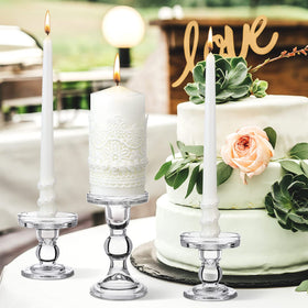 Irenare lace-decorated candles add elegant texture to ceremony décor