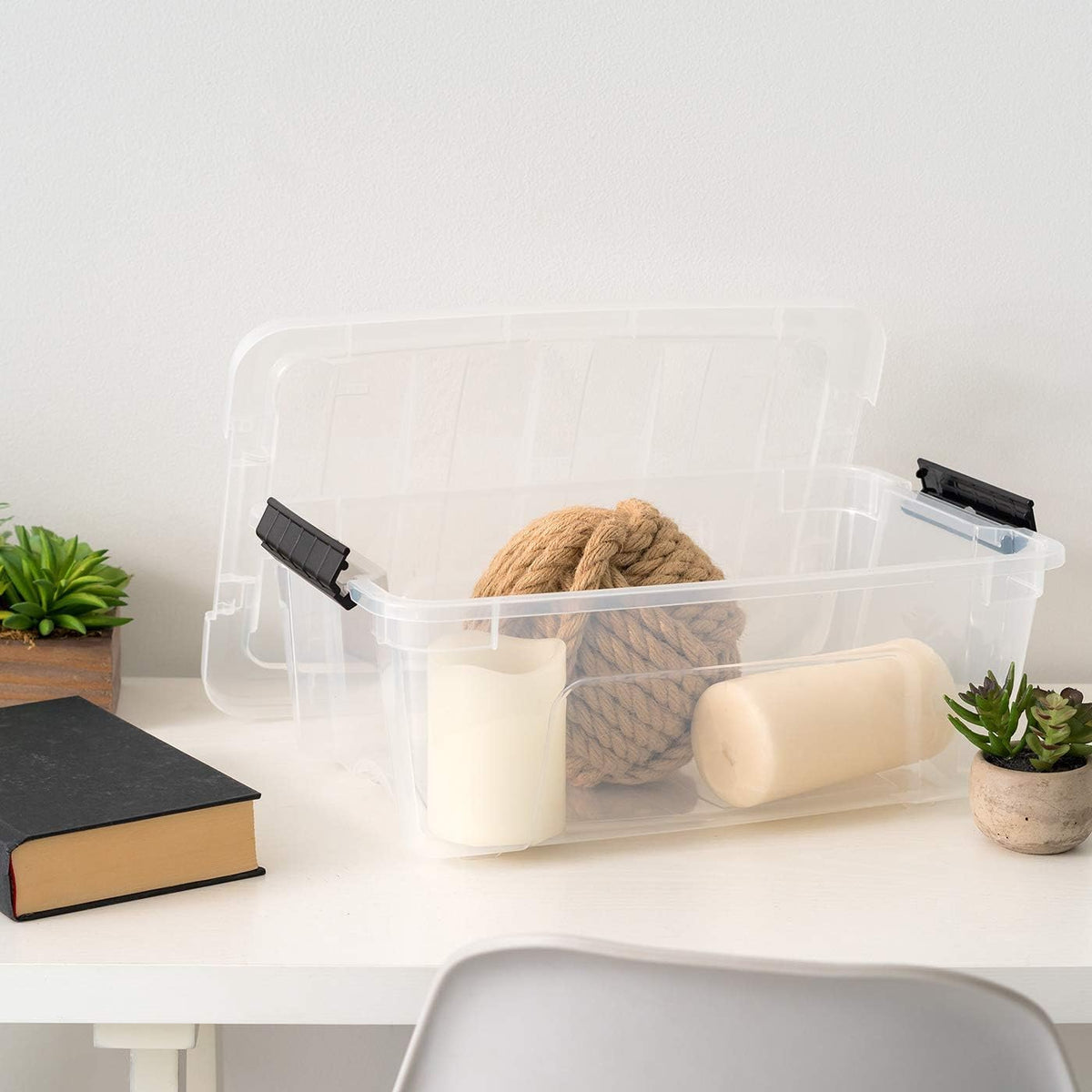 IRIS USA 13qt storage box measures 16.5 by 11 inches for compact storage.