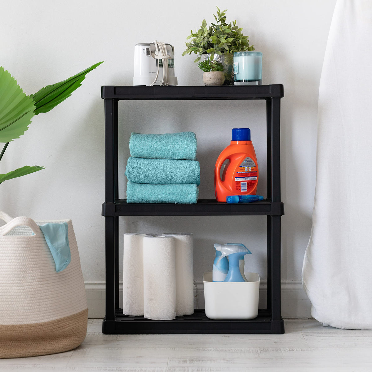 IRIS USA 3-shelf keeps belongings organized, from towels to tools.