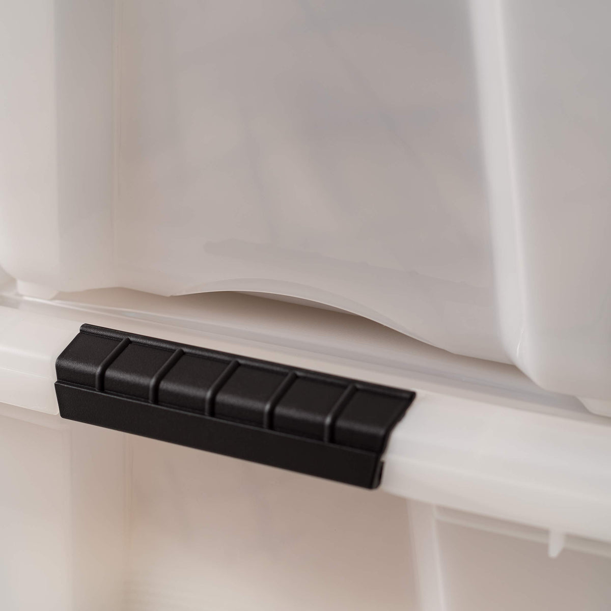 IRIS USA 32 Qt bin stacked demonstrates space maximization in home storage.
