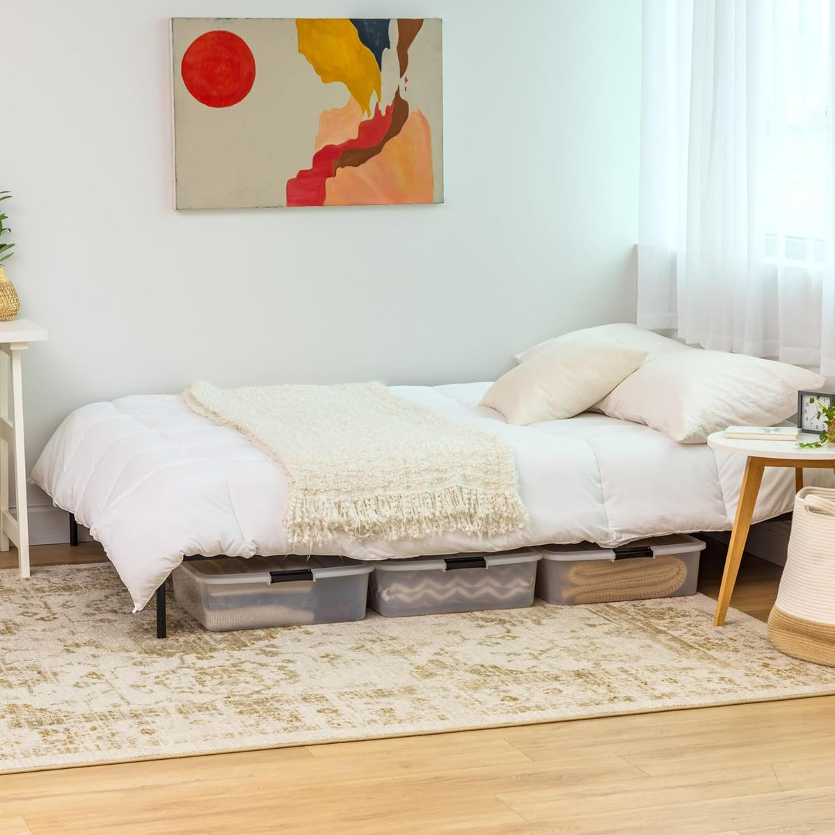 IRIS USA under-bed storage bin with secure lid protects contents from dust.