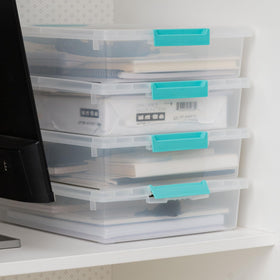 Clear plastic storage bin shows contents for quick project planning.