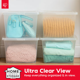 IRIS USA storage bin organized blankets and towels.