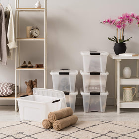 IRIS USA latch-secured lid on pearl bin ensures secure containment of items.