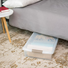 Iris USA nestable bin stacks neatly to save space in the closet.