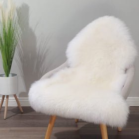 IRIWOOL fluffy lambskin rug, perfect as seat cover on sofa or chair.