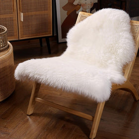 IRIWOOL premium genuine sheepskin rug, creamy white 2x3ft, soft warmth for home decor.