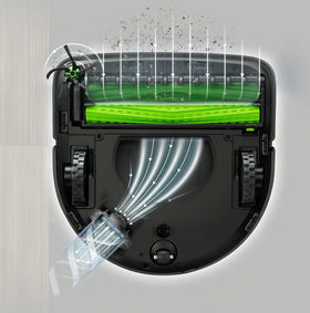iRobot Roomba s Series brushes in use, capturing dirt with flexible rubber bristles for thorough pickup.
