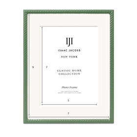 Isaac Jacobs 7x9 frame on a shelf highlights photos as focal points.