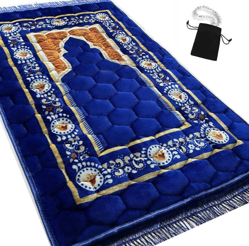 Islamika royal blue prayer rug folded for compact storage and travel readiness