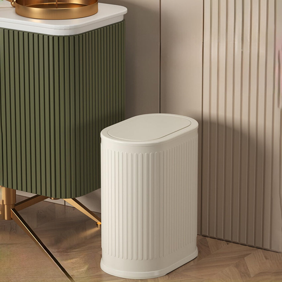 IVTUVTI 1.6-gallon trash can with lid fits tight spaces and keeps odors contained.
