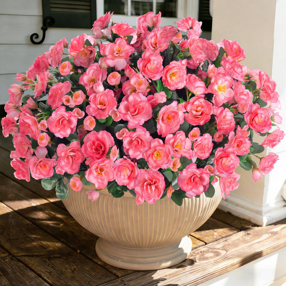 Ivydale artificial camellia outdoor plant pink bloom in a sunlit pot for year-round decor.