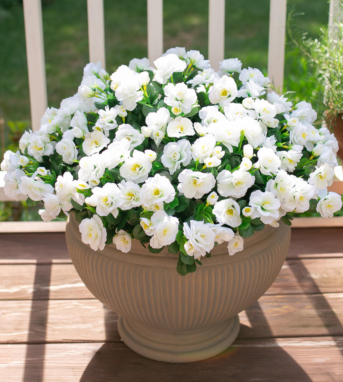 Ivydale camellia sunlit outdoor faux plant enhances porches with subtle vibrancy.
