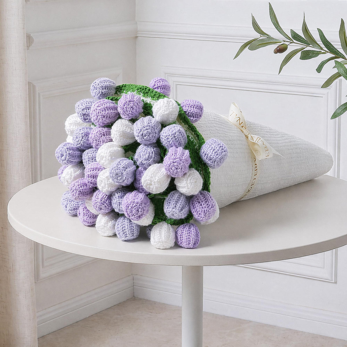 Ivydale Crochet Flower Bouquet Throw Blanket in pink and white, ideal for cozy living room decor.