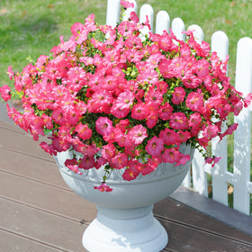 Ivydale yard display uses low-maintenance faux blooms for garden charm