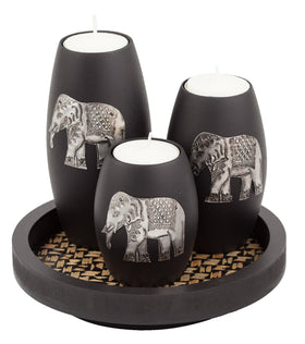 IYARA CRAFT elephant candle holder on the tray, perfect as a warm holiday centerpiece.