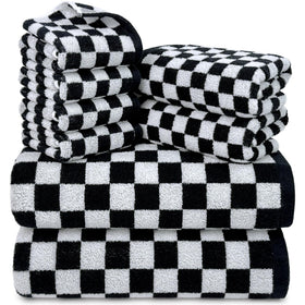 Jacquotha black and white towels set displayed, showing bold checkered pattern and cotton texture