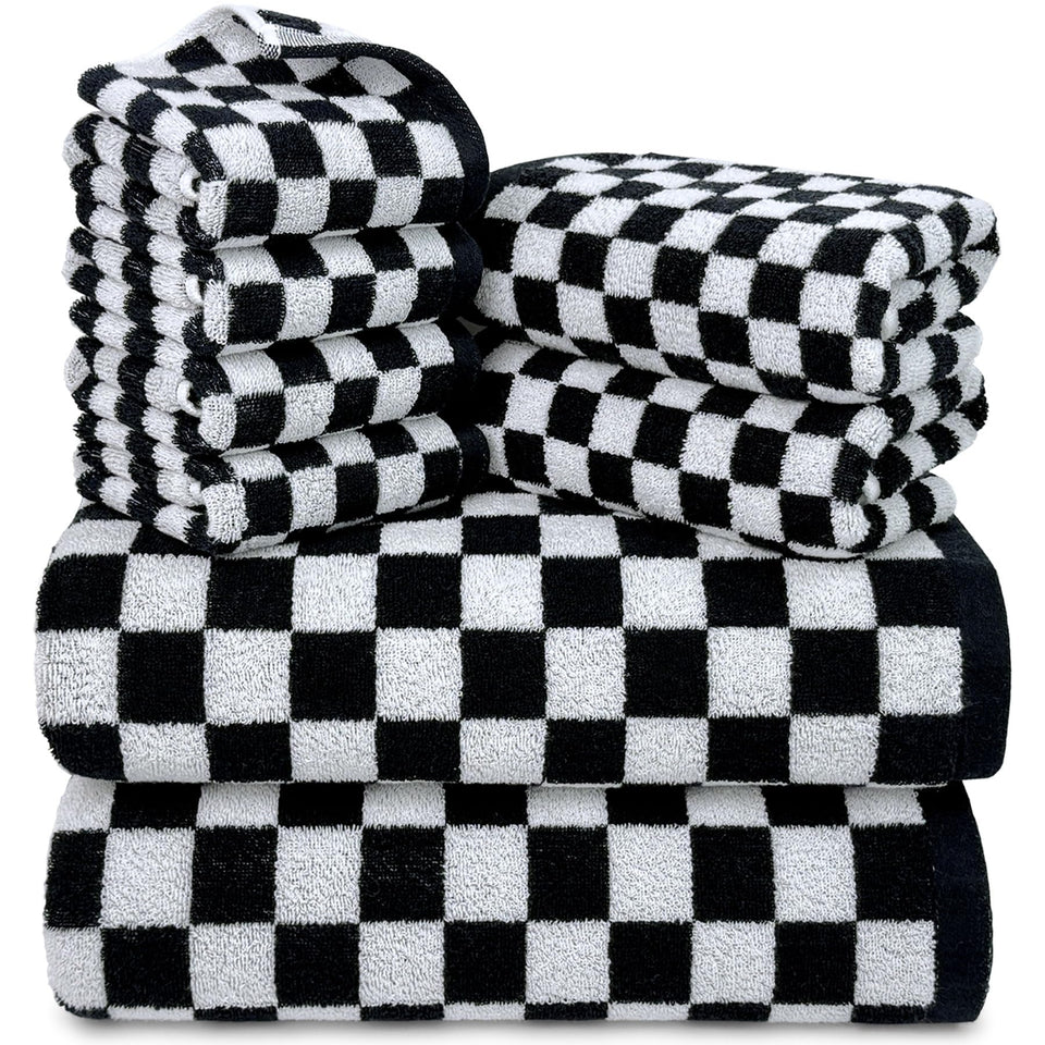 Jacquotha black and white towels set displayed, showing bold checkered pattern and cotton texture