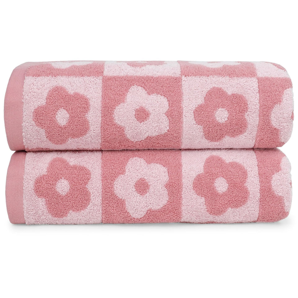 Jacquotha checkered floral pink bath towel on rack, soft and absorbent for daily showers.