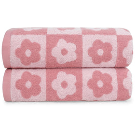 Jacquotha checkered floral pink bath towel on rack, soft and absorbent for daily showers.