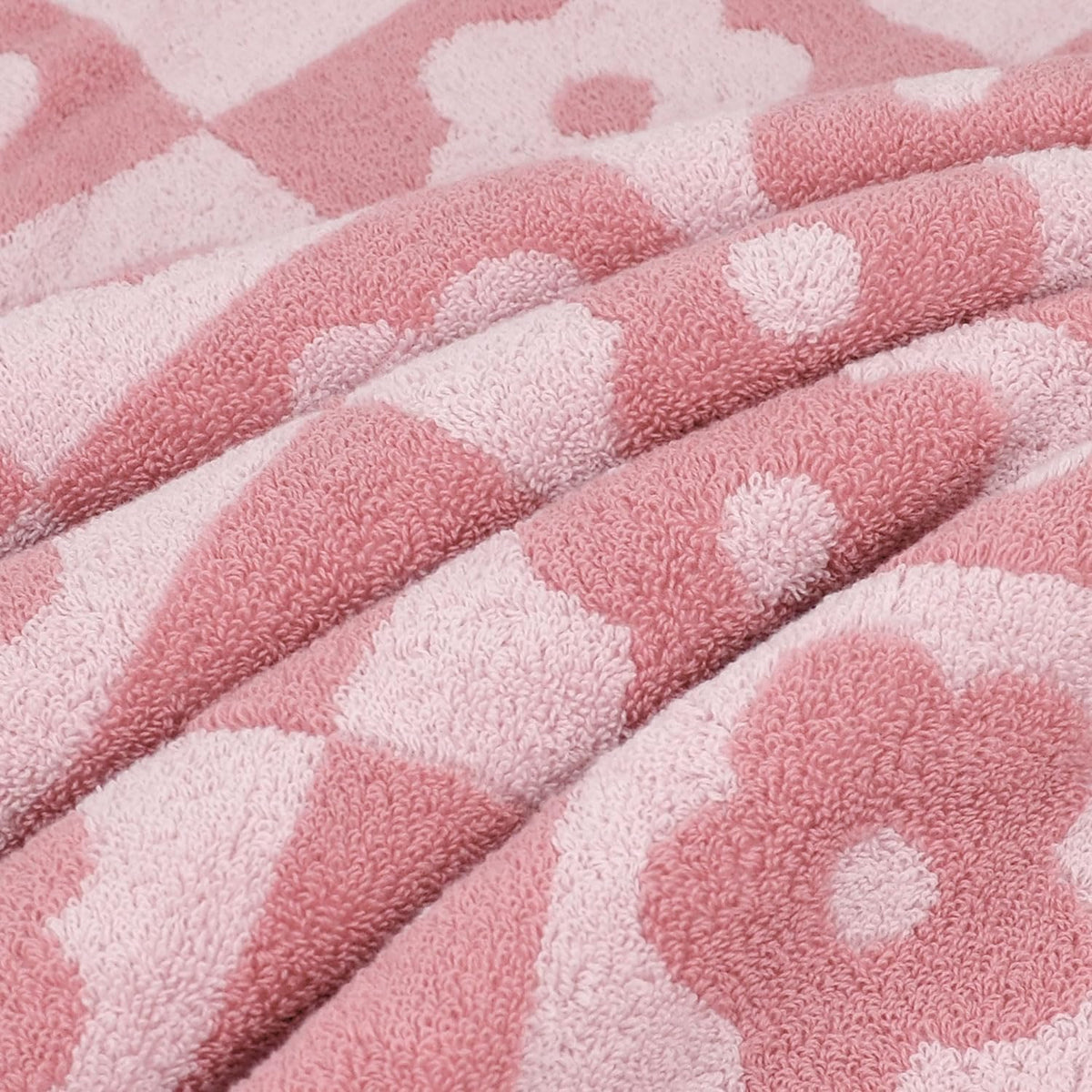 Jacquotha checkered floral pink towels in bathroom decor for a stylish touch.
